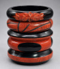 BB322 paprika and black bakelite bangles stack